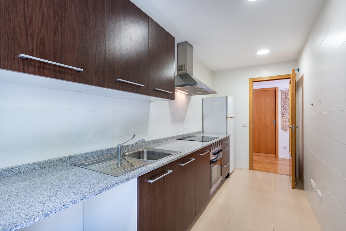 14-kitchen-granite-worktop-hallway-access-1200×800 El Jardín — Garden Apartment in Son Rapinya