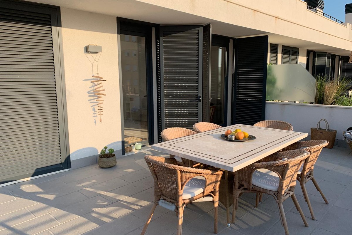 Terrace dining in golden-hour light
