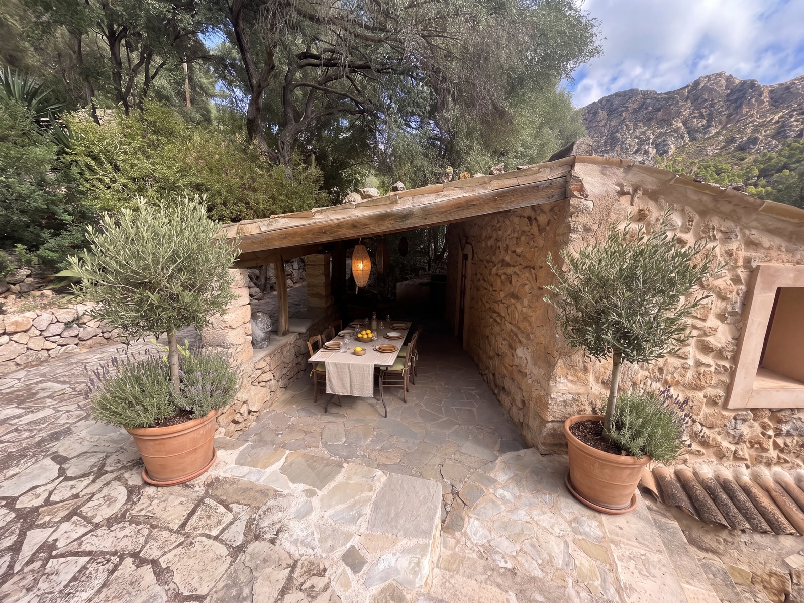 The stone summer house, tidied and set for dinner — visualisation