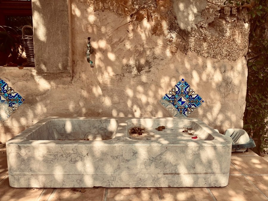 The stone trough in the courtyard
