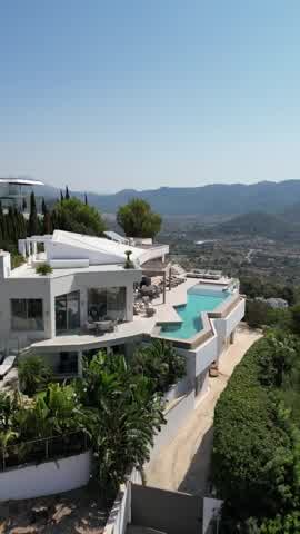 Casa Sunshine, Port d'Andratx — the villa and its infinity pool from the air
