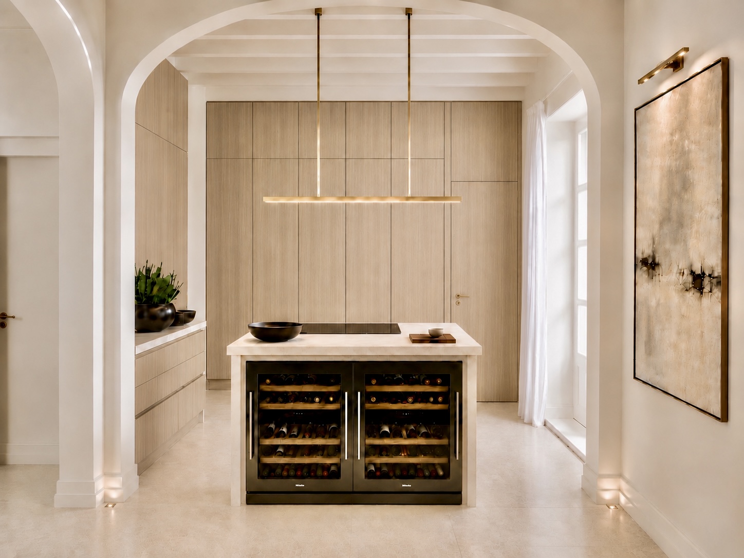 The kitchen at Soul Palace, with a stone island under an arch