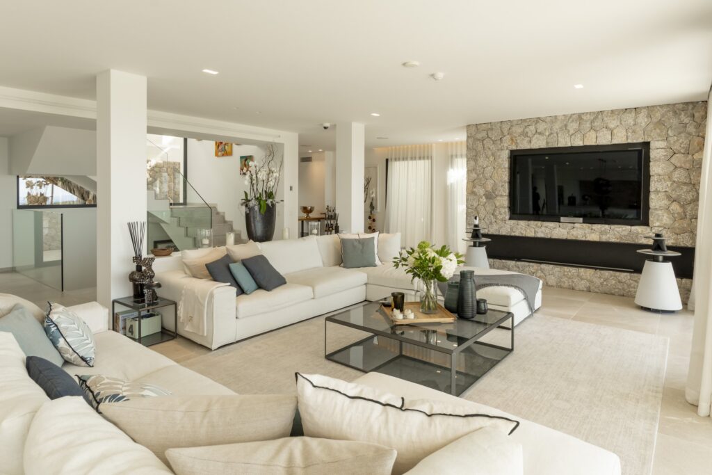 Lounge with stone fireplace wall